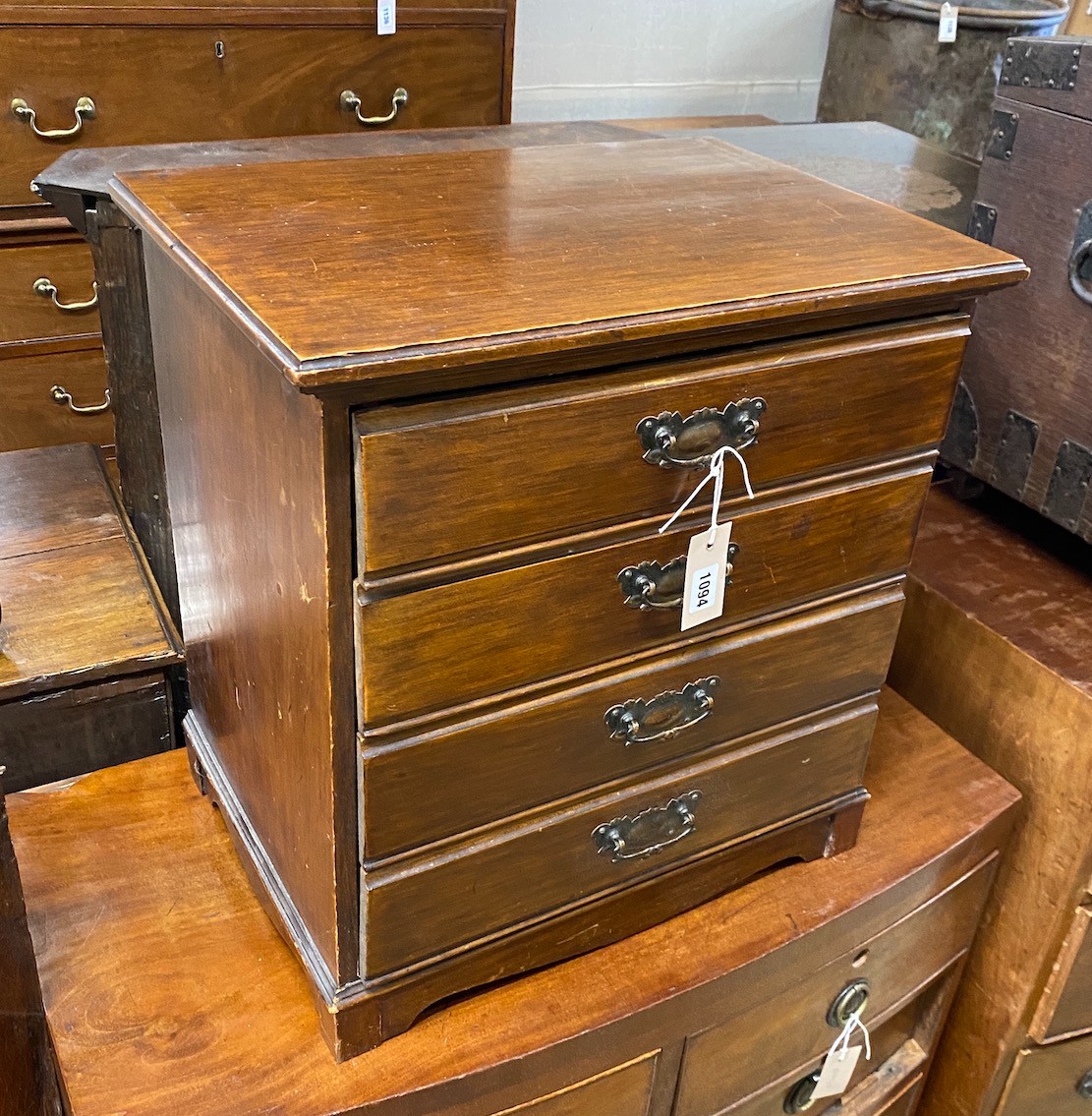 An Edwardian mahogany four drawer sheet music cabinet, width 50cm, depth 36cm, height 52cm